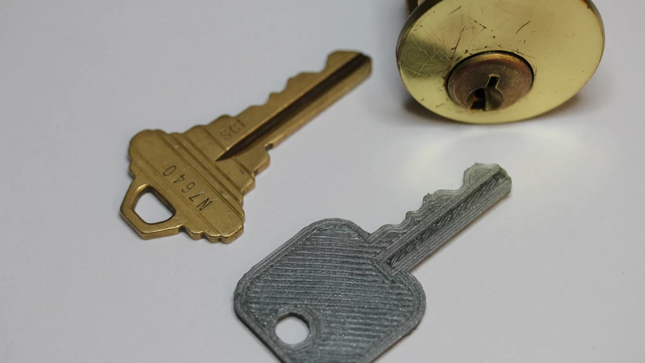 Close up on a plate of mashed potatoes, topped with baked pork chops with cream of mushroom soup, and a side of green beans.