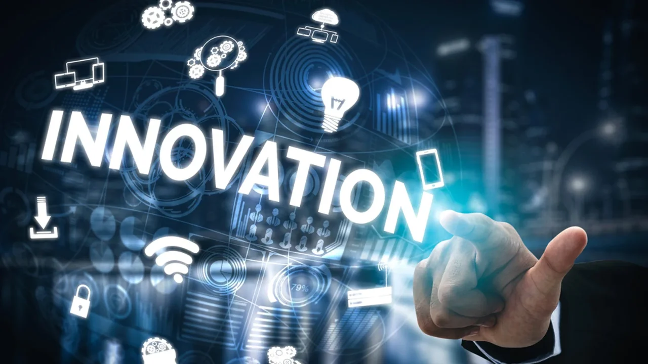 Close up on a plate of mashed potatoes, topped with baked pork chops with cream of mushroom soup, and a side of green beans.